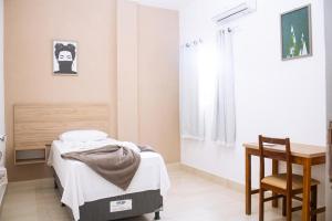 Postel nebo postele na pokoji v ubytování Pousada Salomão
