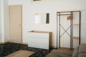 a living room with a closet and a door at Appartamenti Rivo Gelassa in Susa