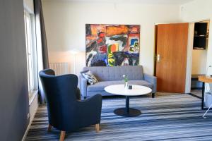 Posezení v ubytování Østergaards Hotel