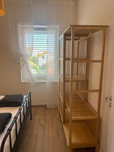Ένα ή περισσότερα κρεβάτια σε δωμάτιο στο Villa Regina Apartment Carlito with swimming pool +38 φωτογραφίες