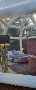 Posteľ alebo postele v izbe v ubytovaní Bubble Glamping Sicily