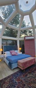Posteľ alebo postele v izbe v ubytovaní Bubble Glamping Sicily
