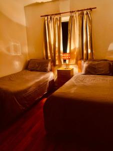 En eller flere senge i et værelse på PENTHOUSE APARTMENT Cork