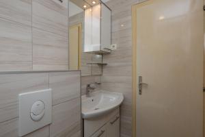 Koupelna v ubytování Rooms Ivka + 22 fotografií