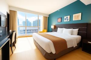 En TV eller et underholdningssystem på Tryp by Wyndham Panama Centro