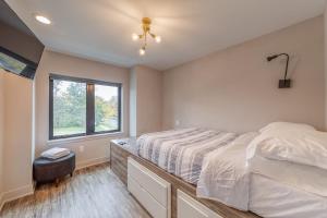 a bedroom with a bed and a window at Great Value in A2 close to UofM Private Suite in Ann Arbor