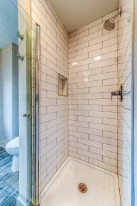 a bathroom with a shower and a toilet at Great Value in A2 close to UofM Private Suite in Ann Arbor