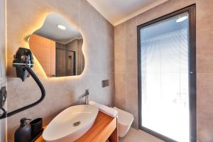 Koupelna v ubytování Lyxos Hotel