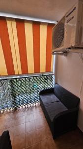 Et opholdsområde på Tropicana Holiday Home