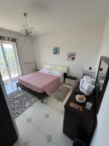 Postel nebo postele na pokoji v ubytování Yasmir Home