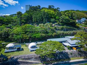an aerial view of a park with tents and trees at Glamping & Villas La-gom - Vacation STAY 23572v in Inatori