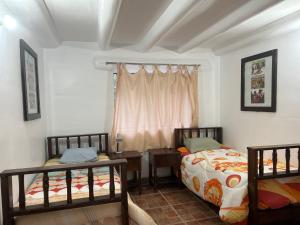 Postel nebo postele na pokoji v ubytování Bed and Breakfasts - Ollantaytambo by ViaHero