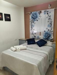 Postel nebo postele na pokoji v ubytování Alojamiento Zaidín