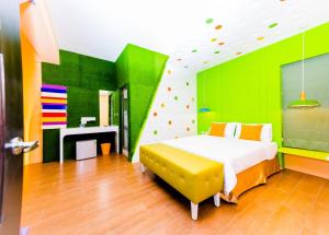 Postel nebo postele na pokoji v ubytování Zih Yue Tong Homestay II