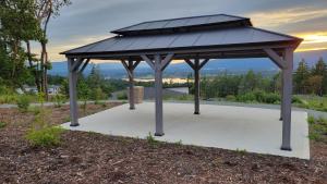 a gazebo with a solar panel on it at Modern Mt Tzouhalem Suite with Panoramic Views in Duncan