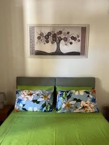 Postel nebo postele na pokoji v ubytování Casa vacanza relax a due passi dal mare
