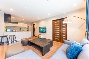 a living room with a couch and a table at Poka villa aoyama - Vacation STAY 19050 in Tokyo