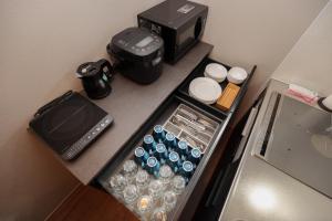 Příslušenství pro přípravu čaje a kávy v ubytování Mountain Green Yufu - Vacation STAY 09422v