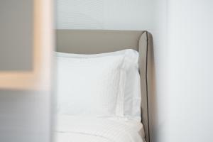 Voodi või voodid majutusasutuse Magnus Hotel toas