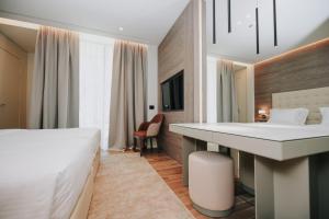 Voodi või voodid majutusasutuse Magnus Hotel toas