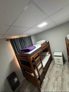 a bunk bed in a room with a ceiling at CTA DIVISION House in Malargüe