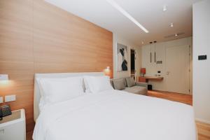 Voodi või voodid majutusasutuse Magnus Hotel toas