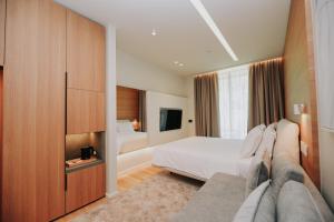 Voodi või voodid majutusasutuse Magnus Hotel toas