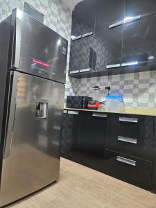 Kuchyň nebo kuchyňský kout v ubytování Ambiance abodes