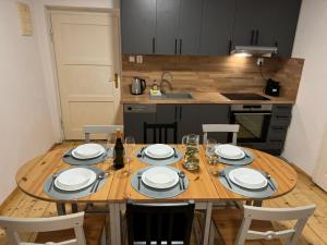 Kuchyň nebo kuchyňský kout v ubytování Apartmány Kanteho grunt