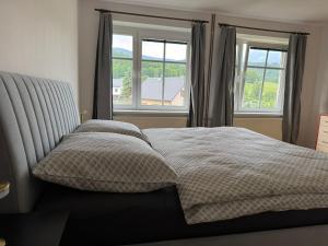 Postel nebo postele na pokoji v ubytování Apartmány Kanteho grunt