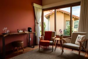 Lavandas de Cunha Pousada Boutique的休息区