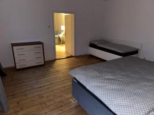 Postel nebo postele na pokoji v ubytování Apartmány Kanteho grunt
