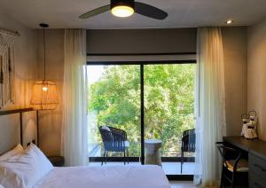 Katil atau katil-katil dalam bilik di New Bamboo Bakal 1 Pool and Relaxation +37 gambar