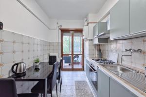 Kuchyň nebo kuchyňský kout v ubytování Bellavista Palladio