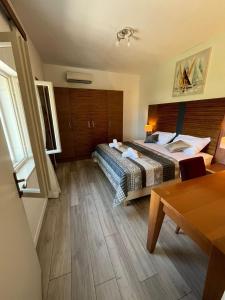 Posteľ alebo postele v izbe v ubytovaní Apartments with parking spaces Slano, Dubrovnik - 8540