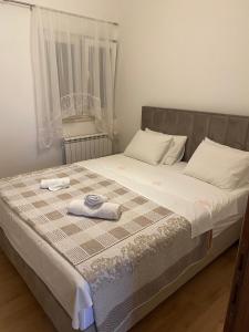 Posteľ alebo postele v izbe v ubytovaní Apartment Sukosan 16641c