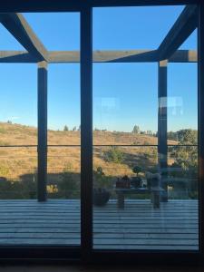 a view from the window of a house at Casa de campo Matanzas in Navidad