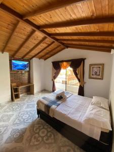 Postel nebo postele na pokoji v ubytování Acogedor apartamento cerca al tranvía 301