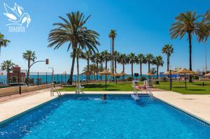 Bazén v ubytovaní Aloha Playa Apartment with panoramic sea view and pools alebo v jeho blízkosti