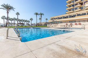 Bazén v ubytovaní Aloha Playa Apartment with panoramic sea view and pools alebo v jeho blízkosti