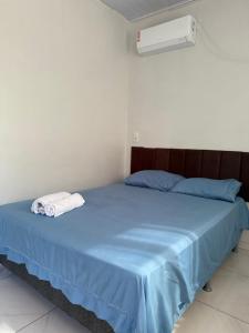 Postel nebo postele na pokoji v ubytování Apto Serras Gerais