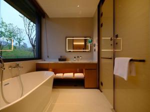 Ruolinqiao Valley Garden Hotel的一间浴室
