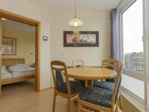 Un pat sau paturi într-o cameră la Kurpark Residence Apartment 211B