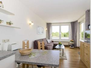 Dapur atau dapur kecil di Kurpark-Residenz Apartment Kugelbake