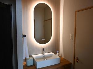 Koupelna v ubytování Komakusa Hotel