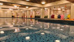 Πισίνα στο ή κοντά στο Spago Inn