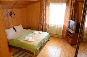 Una cama o camas en una habitación de Sofia Forest Club