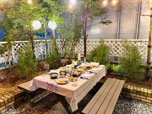 a table with plates of food on top at Polo Tourist Hotel in Incheon