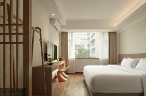 Yinxitang Aesthetic Life Courtyard Hotel Kuanzhai Alley People's Park Subway Station Branch電視和／或娛樂中心