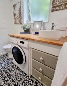 Φωτογραφία από το άλμπουμ του Coastal Rainforest Retreat σε Thirroul